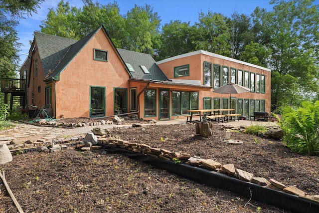 rear view of property with a patio