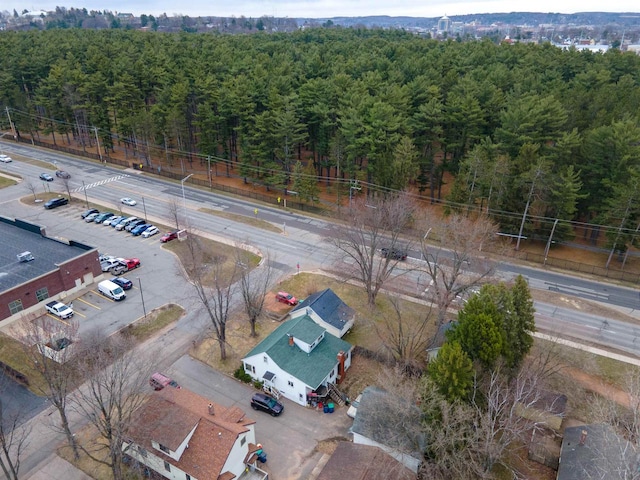 aerial view with a wooded view