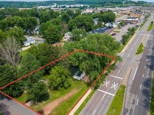 birds eye view of property with a residential view