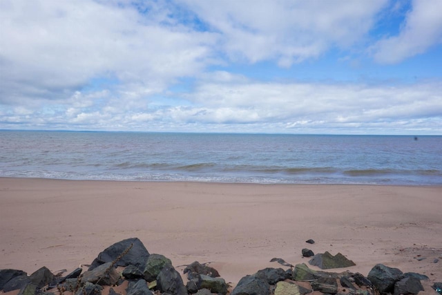 property view of water featuring a view of the beach