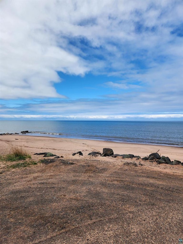 property view of water featuring a view of the beach