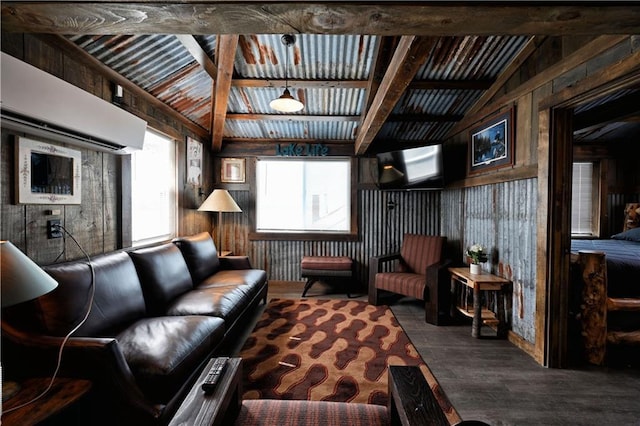 living room with vaulted ceiling with beams, wood walls, a healthy amount of sunlight, and dark wood-type flooring