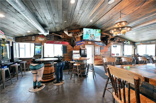 dining space with wood ceiling and lofted ceiling