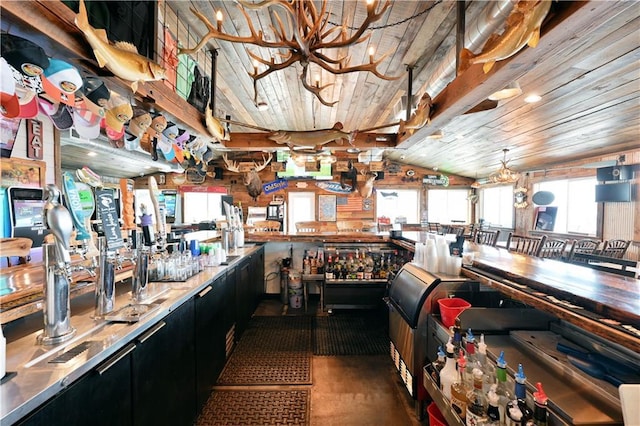 bar with vaulted ceiling and wood ceiling