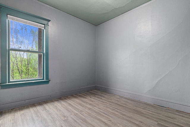 unfurnished room featuring light hardwood / wood-style floors