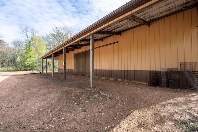 view of side of property featuring central air condition unit