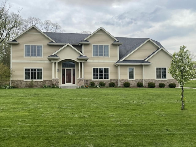 view of front facade with a front yard