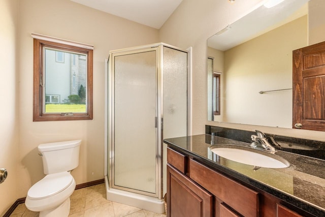 bathroom featuring tile floors, oversized vanity, an enclosed shower, and toilet