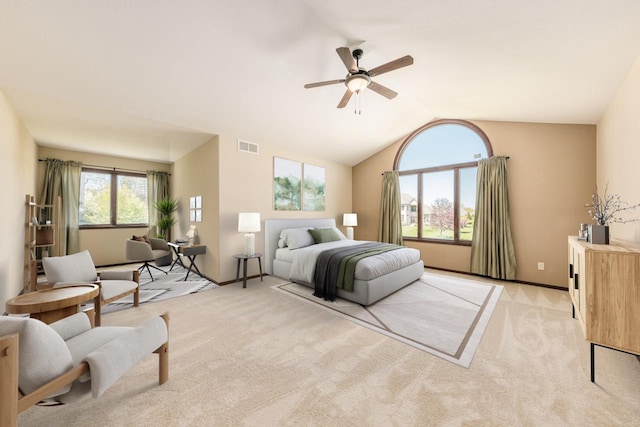 bedroom featuring light colored carpet, ceiling fan, and lofted ceiling