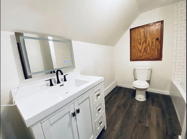 bathroom with hardwood / wood-style floors, vanity, vaulted ceiling, toilet, and baseboard heating