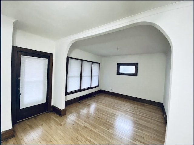 spare room featuring hardwood / wood-style floors