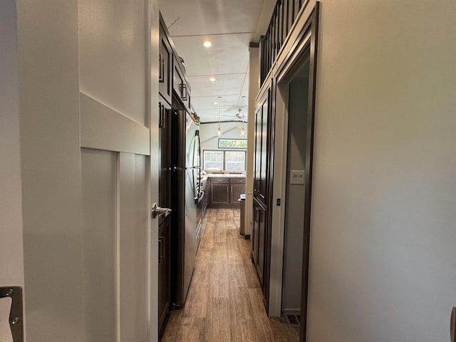 hallway featuring wood-type flooring