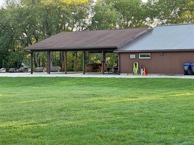 exterior space with a yard and a patio area