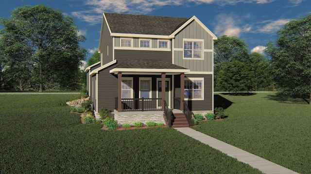 view of front of house with covered porch and a front lawn