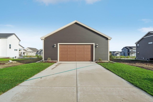 garage featuring a yard