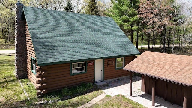 view of log cabin