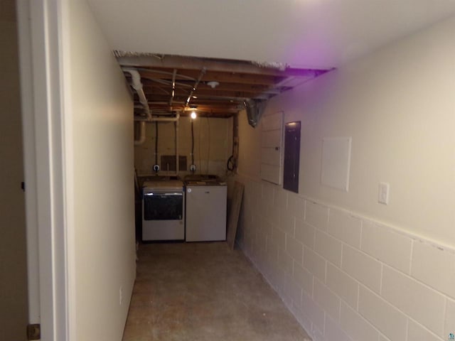 basement featuring washer and clothes dryer