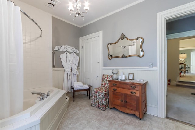 bathroom with tile floors, ornamental molding, a relaxing tiled bath, and a notable chandelier