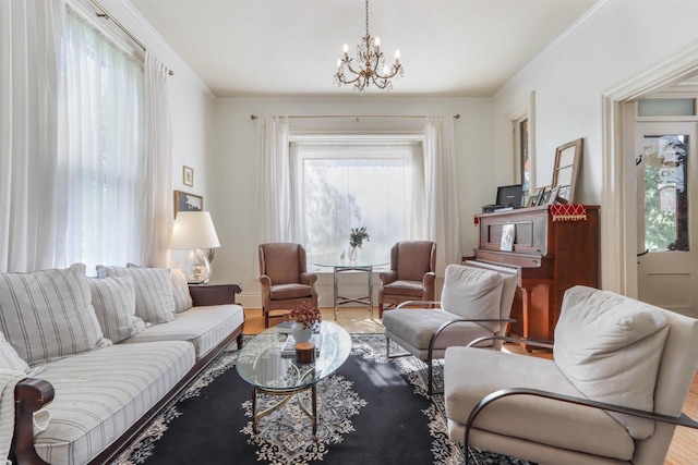 living room with wood-type flooring and an inviting chandelier