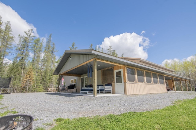 back of property with a patio area