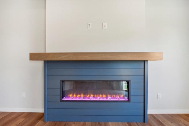 interior details with hardwood / wood-style flooring