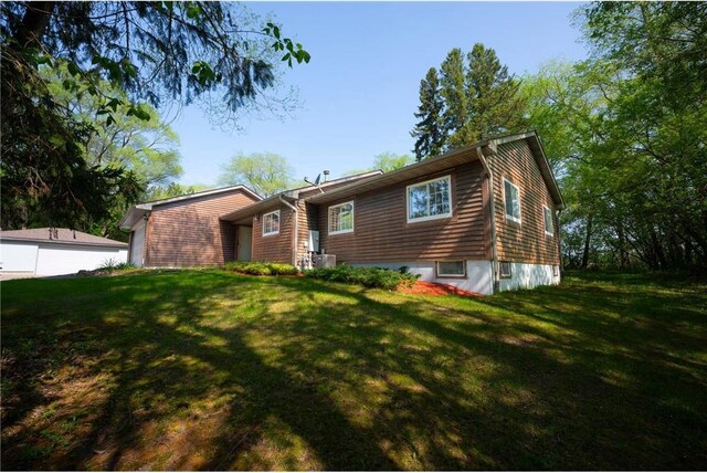 view of front of home with a front lawn