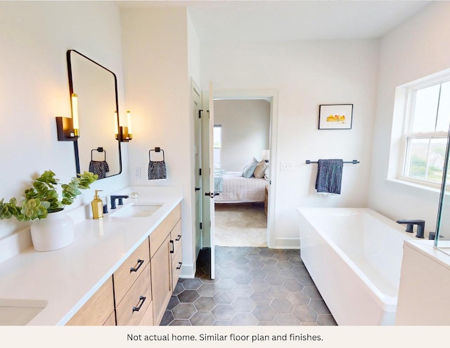 bathroom featuring tile patterned flooring, vanity, and a tub