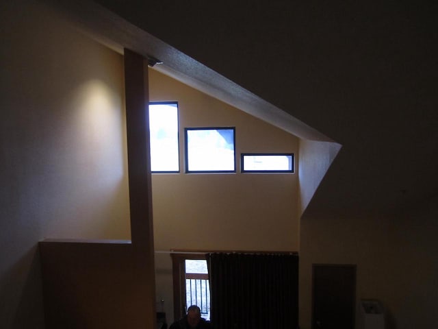 interior space featuring a wealth of natural light and lofted ceiling