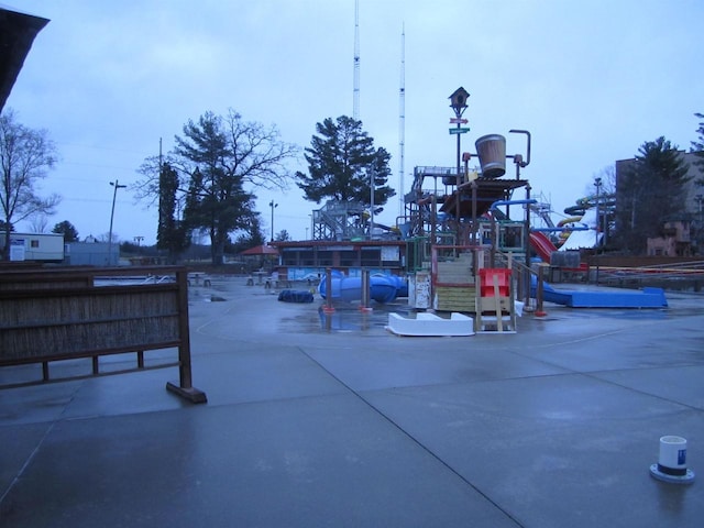 view of property's community with a playground