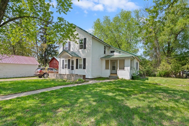 view of front of home featuring a front yard