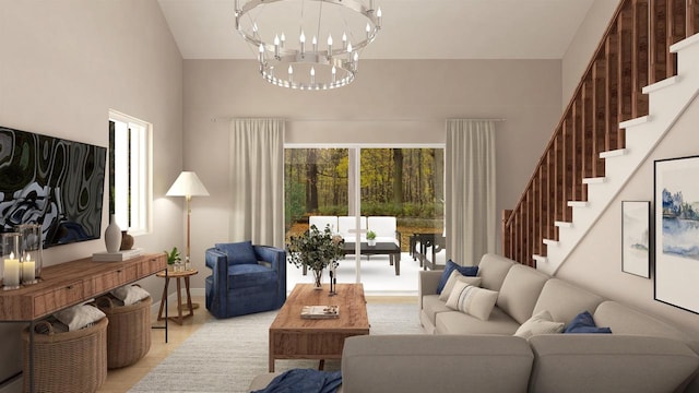 living room featuring a towering ceiling, light wood-type flooring, and an inviting chandelier