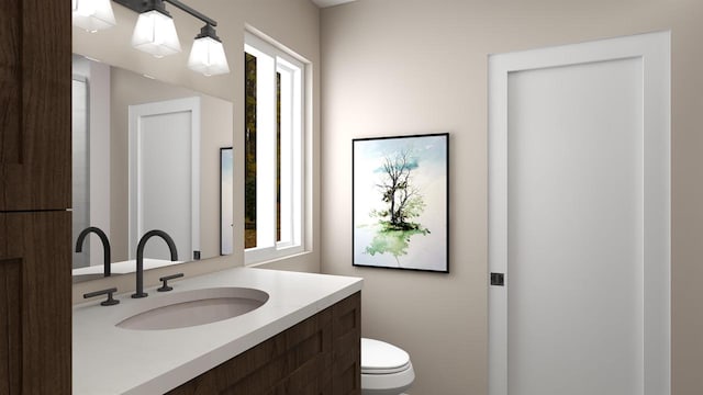 bathroom with vanity and toilet