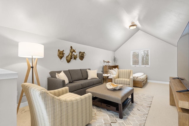 living room featuring light colored carpet and lofted ceiling