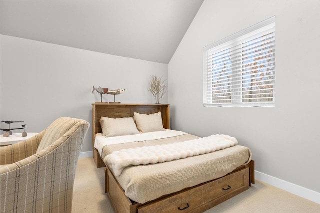 carpeted bedroom featuring vaulted ceiling