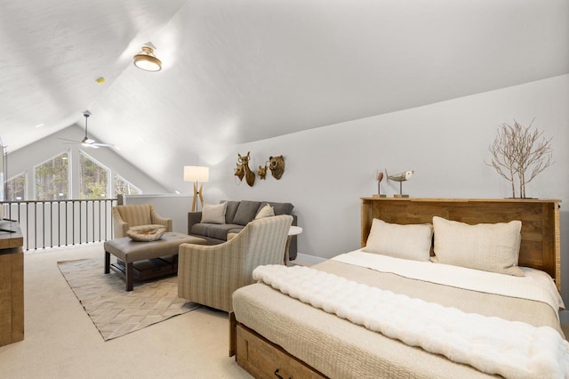 carpeted bedroom featuring lofted ceiling