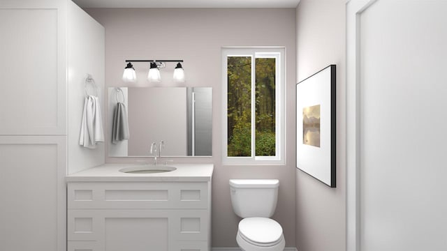 bathroom with vanity and toilet