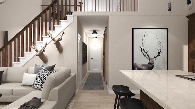 living room with light hardwood / wood-style flooring