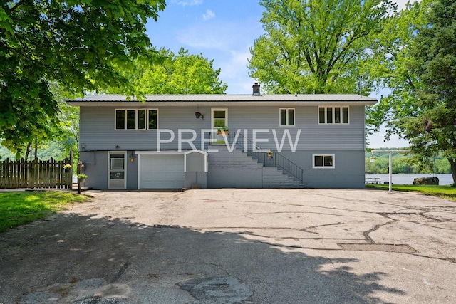 raised ranch featuring a garage