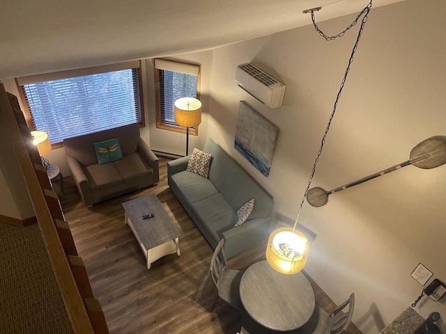 living room with dark wood-type flooring, a baseboard radiator, and a wall mounted air conditioner