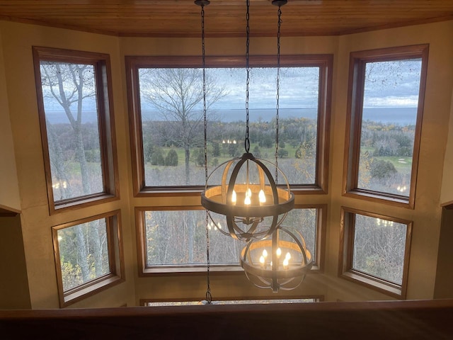 interior details with wooden ceiling and a chandelier