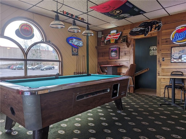 rec room featuring wooden walls, carpet, billiards, and a paneled ceiling