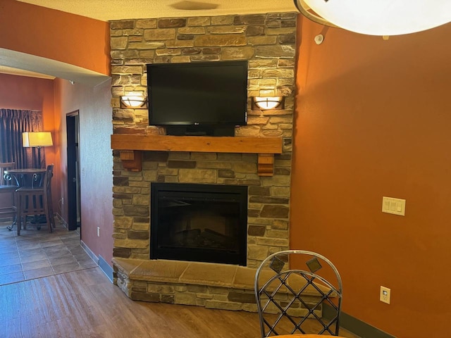 living room featuring hardwood / wood-style floors and a fireplace