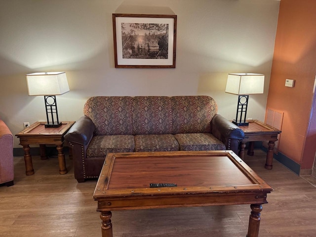 living room with hardwood / wood-style flooring