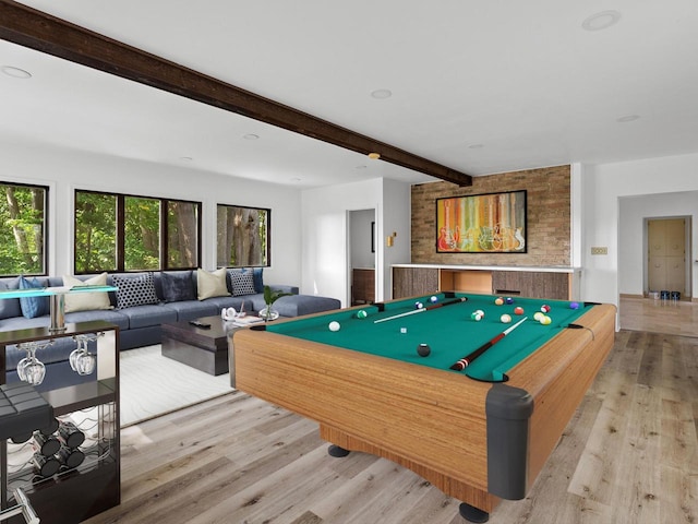 playroom with beam ceiling, light wood-type flooring, and pool table