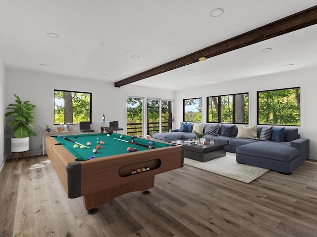 recreation room with pool table, beamed ceiling, and light wood-type flooring