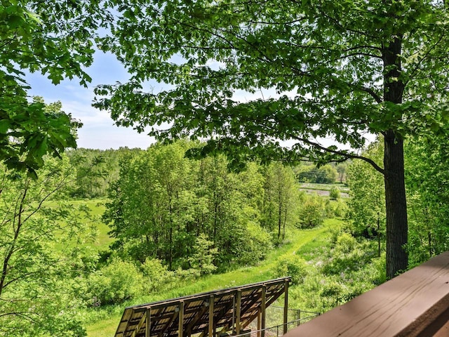 1608 N Rapids Rd, Manitowoc, WI 54220 - deck with a forest view