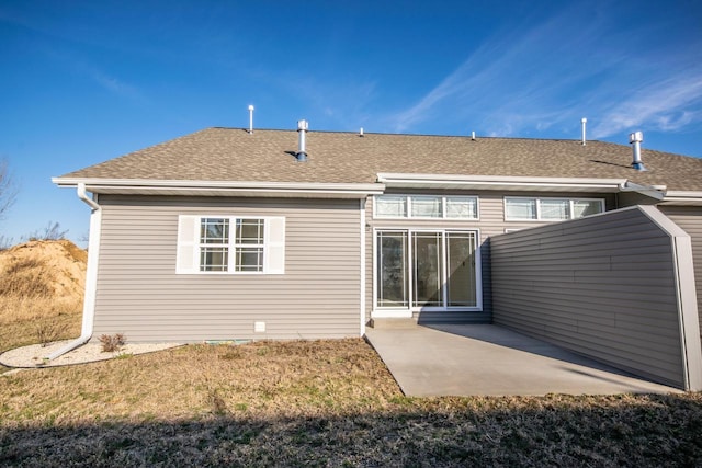 back of property with a patio area