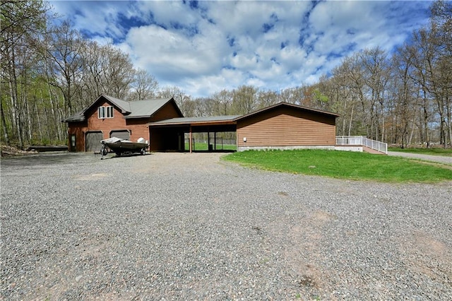 view of front of property with a carport