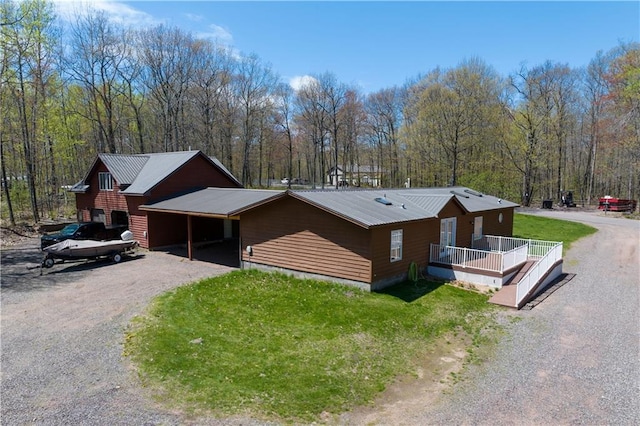 view of front of home featuring a wooden deck