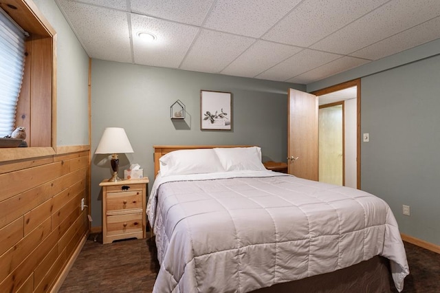 bedroom featuring a drop ceiling